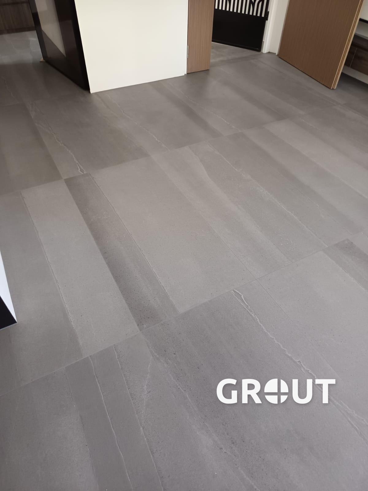 Grey floor tiles with epoxy grout